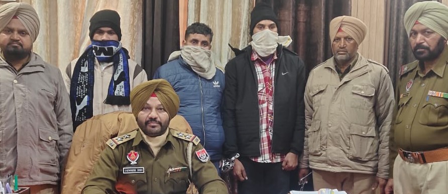 Three arrested for snatching phone from migrant.