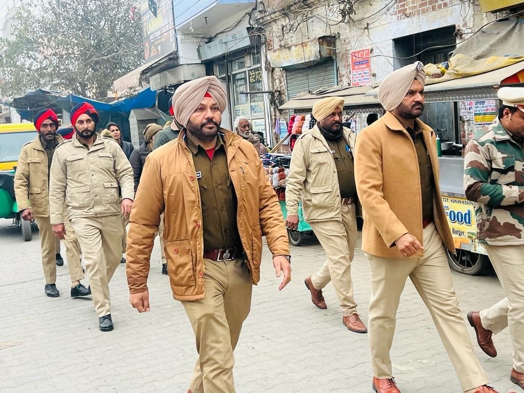 Nakodar police hold flag march.