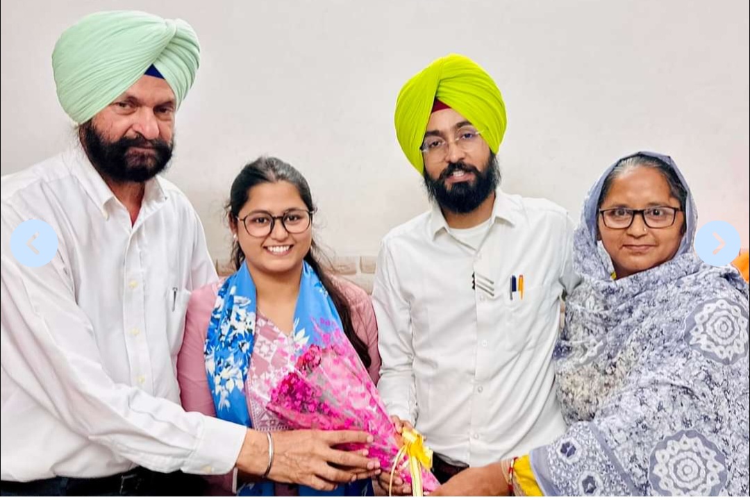 Mahipinder Singh of Baba Farid law college congratulates Sumanjeet Kaur,on her selection for PCS judical