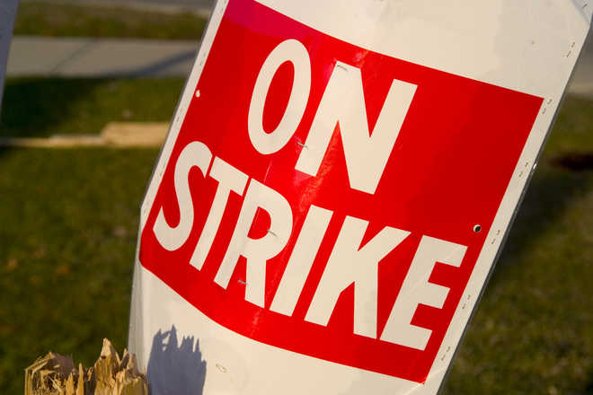 Work paralyzed in govt offices following strike by PCS officers