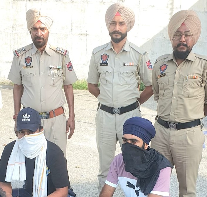 Two arrested for snatching cash